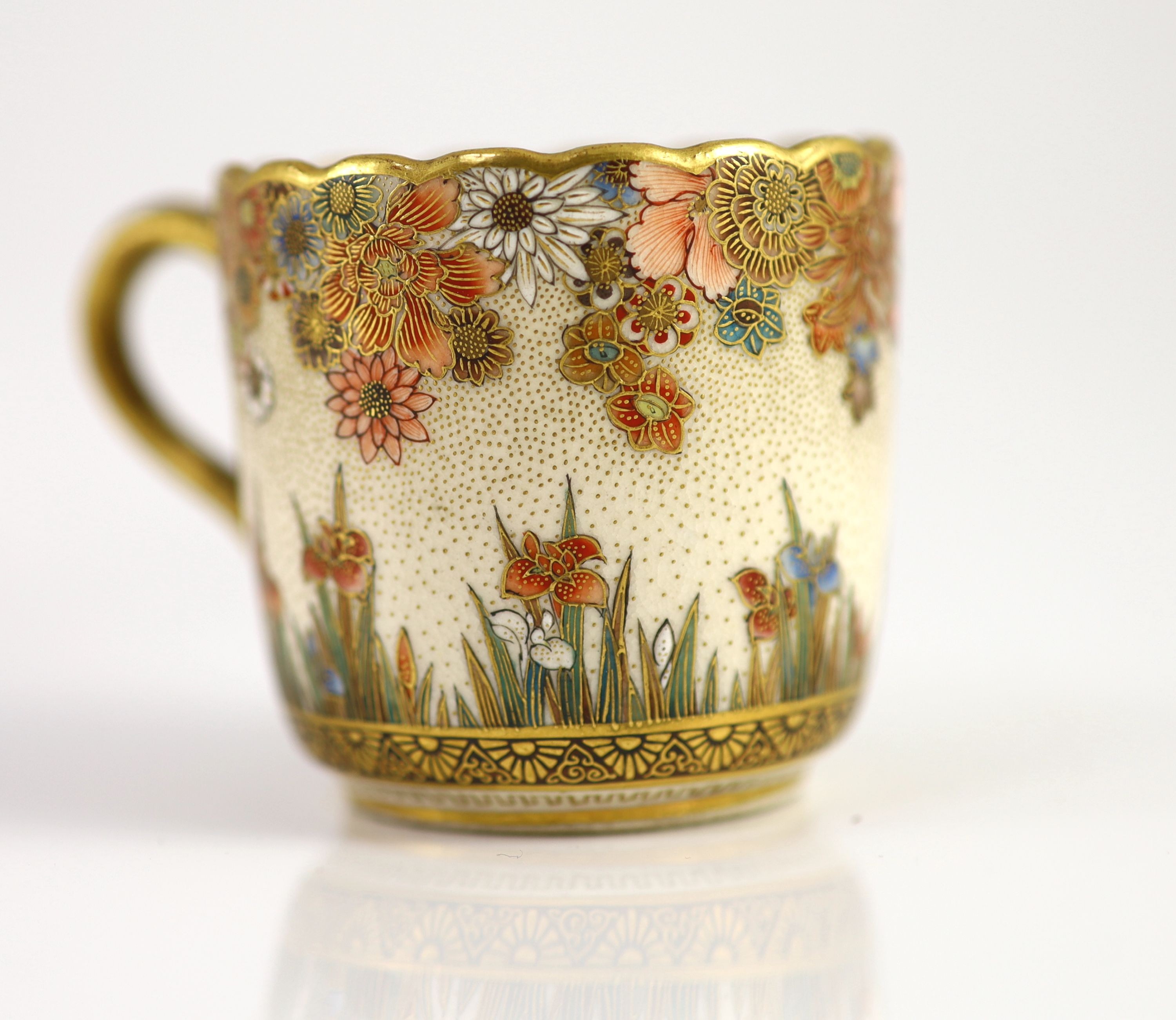 A Japanese Satsuma pottery cup and saucer, signed Seikozan, Meiji period, 11cm diameter